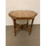 An octagonal centre table (H70cm W30cm D30cm) AF