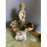 A low bird bath with a boy playing a pipe (H90cm)