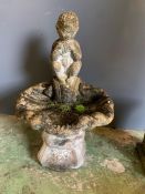 A low bird bath with a boy playing a pipe (H90cm)