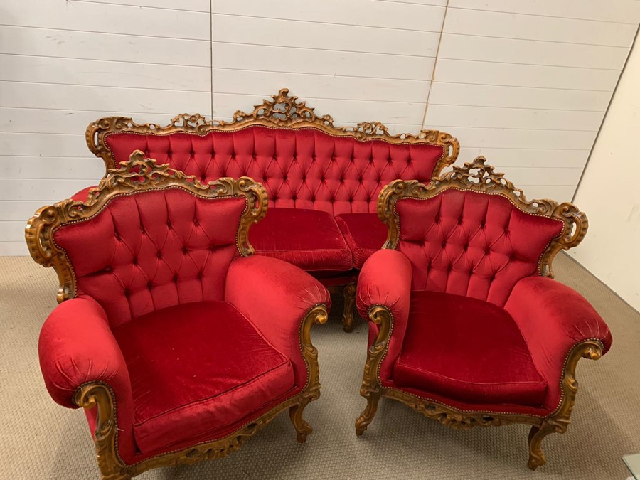 A three piece carved salon suite in red, button back - Image 3 of 6