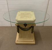 A Silik centre table on column base and glass top
