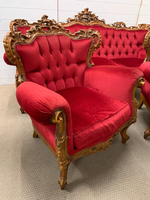 A three piece carved salon suite in red, button back - Image 5 of 6