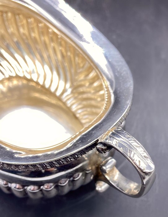 A Three piece silver tea set to include teapot, milk jug, sugar bowl (Arthur & John Zimmerman) Total - Image 7 of 8