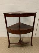 A mahogany corner wash stand