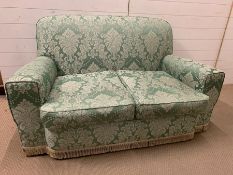 A two seater sofa (H80cm W150cm D74cm)