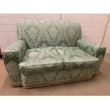 A two seater sofa (H80cm W150cm D74cm)