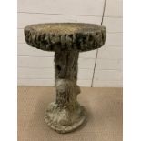 A bird bath in the form of a tree trunk (H68cm)