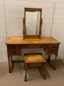 A Stuart Linford burr oak dressing table with drawers to side and centre along with a stool and