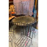 A reclaimed tiled top garden table on metal frame and eight garden metal chairs
