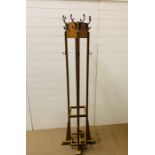 An Art Deco Walnut Coat and Stick Stand