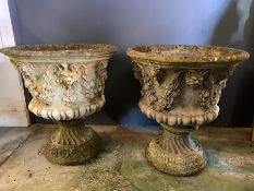 A pair of stone garden planters with lion head decoration (H58cm Dia53cm)