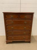 A two over four chest of drawer (H106cm W91cm D46cm)