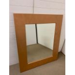 A large square mirror (119cm x 140cm)