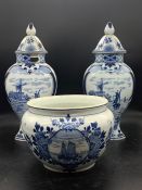 A Delft Garniture set (AF) comprising a bowl and two lidded vase