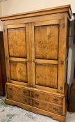 A Steward Linford gentleman's press wardrobe with hanging rail and drawers inside and two drawers