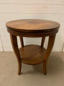 A walnut style circular occasional table (H67cm Dia 60cm)