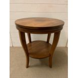 A walnut style circular occasional table (H67cm Dia 60cm)