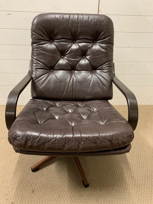 A Mid Century leather swirl chair