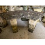 A stone garden bench seat on scrolled ends (H45cm W100cm)