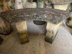 A stone garden bench seat on scrolled ends (H45cm W100cm)