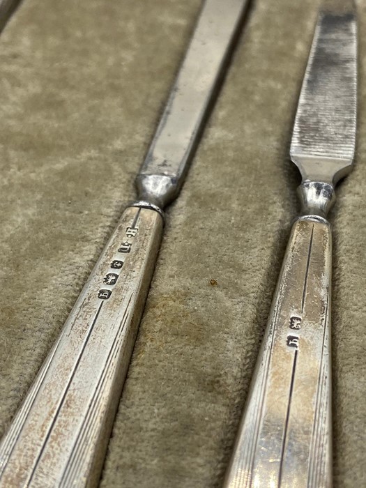 A cased silver handled and mounted vanity set for Finnigans of Bond Street, makers mark for Henry