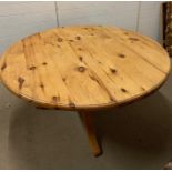 A pine kitchen table (H73cm Dia136cm)