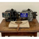 Two vintage Argo taxi cab meters along with a British Rail bag