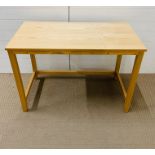 A contemporary pine desk (H75cm W105cm D52cm)