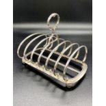 An interesting large toast rack with PS makers mark.