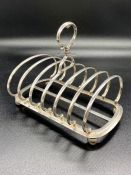 An interesting large toast rack with PS makers mark.