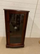 A mahogany style music/steoro cabinet with glaze doors (H106cm W55cm D46cm)