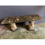 A reclaimed garden stone bench with squirrel base ends (H38cm W103cm)