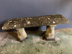 A reclaimed garden stone bench with squirrel base ends (H38cm W103cm)