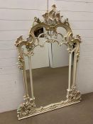 A large baroque Louis XVI style Silik over mantle wall mirror