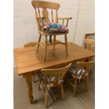 A pine farm house table and chairs