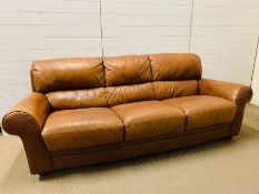 A three seater tan Italian leather sofa by Sofaitalia