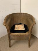 A Lloyd Loom gold chair (Nov 1937)