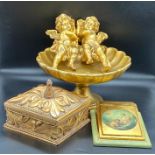 A selection of decorative items including a gilt bowl on stem base, lidded carved box etc.