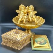 A selection of decorative items including a gilt bowl on stem base, lidded carved box etc.