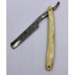 A J W Stutter bone handled razor