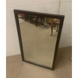 An Oak framed mirror (98cm x 60 cm)