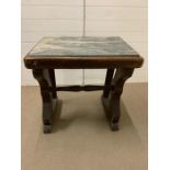 An early 19th century marble top table on wooden base (H76cm W74cm D50cm)