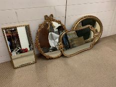 A selection of four gilt framed mirrors