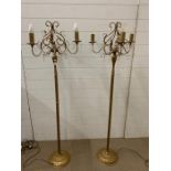 A pair of gilt metal standing lamps with crystal glass style dropless (H145cm)