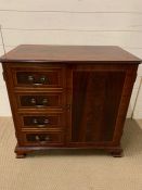 A mahogany unit with faux drawers to front (H76cm W80cm D47cm)