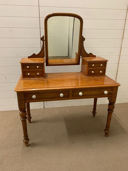 A Victorian pine dressing table with painted string details (H140cm W110cm D84cm)