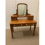 A Victorian pine dressing table with painted string details (H140cm W110cm D84cm)