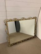 A gilt frame mantel mirror with a leaf design (H98cm W124cm)