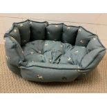 A Sophie Allport pug dog bed (small)