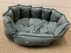 A Sophie Allport pug dog bed (small)